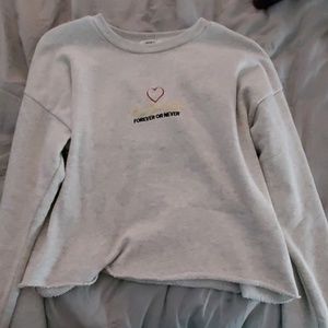 Cropped long-sleeved shirt